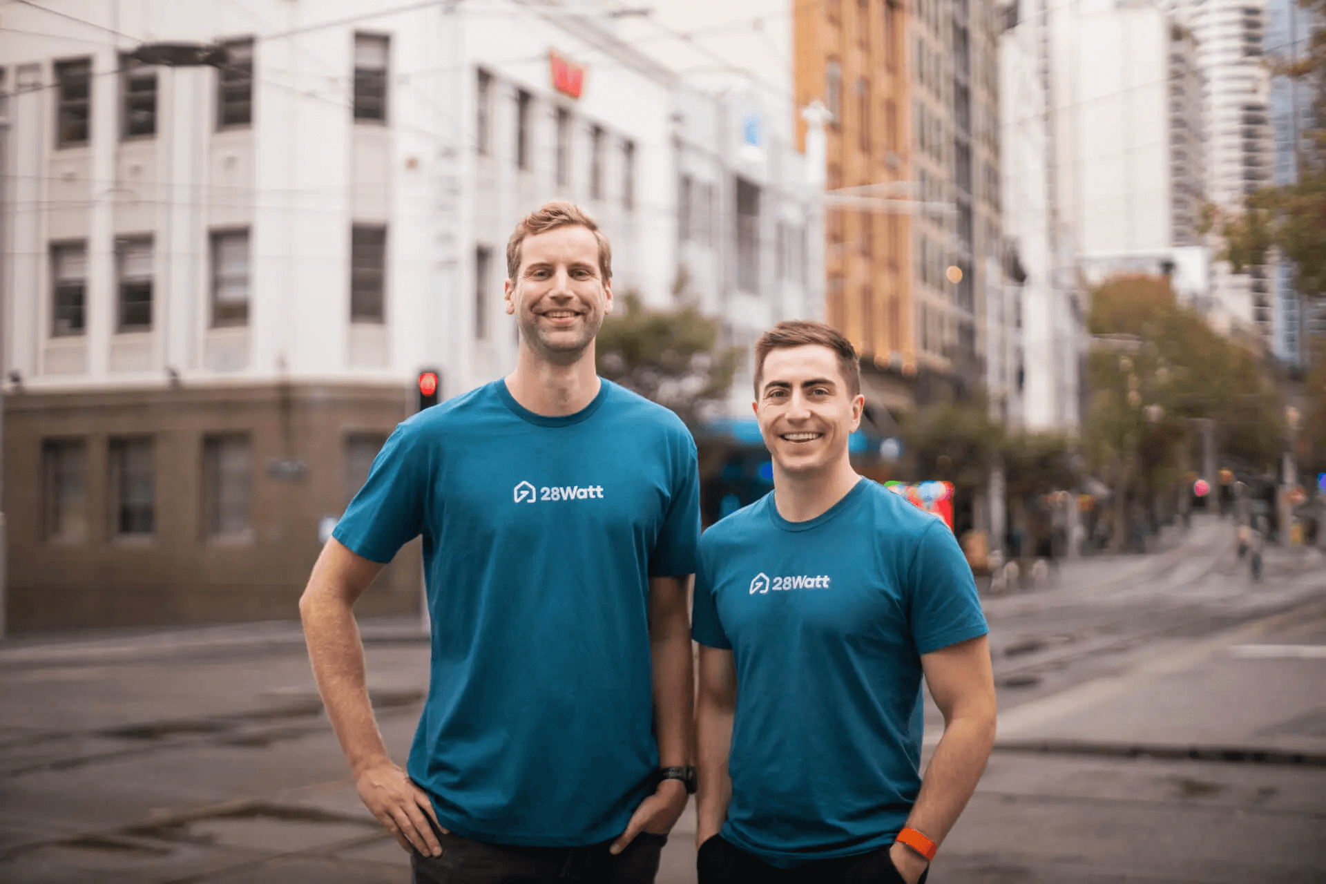 28Watt team members in branded shirts on a Sydney street